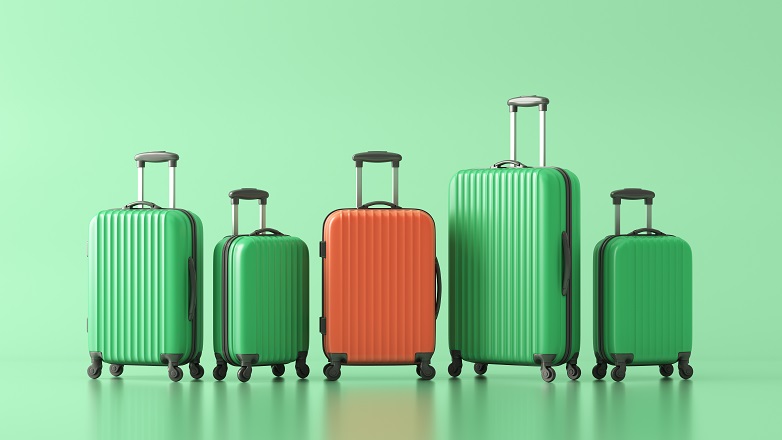 green and orange suitcases