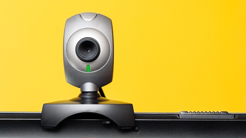Webcam on yellow background