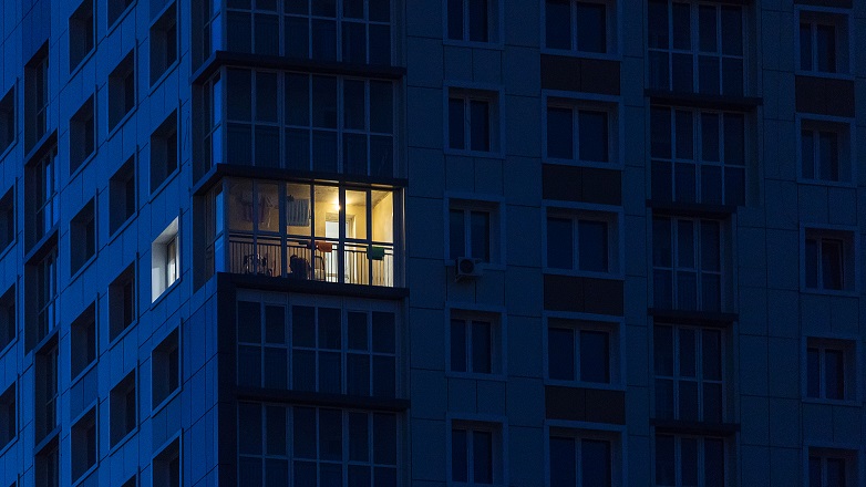 light on in a high rise flat