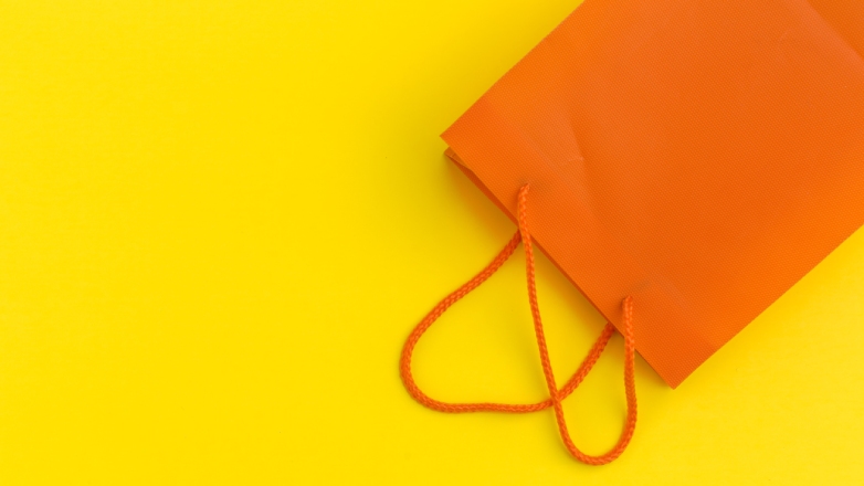 Orange bag on yellow background
